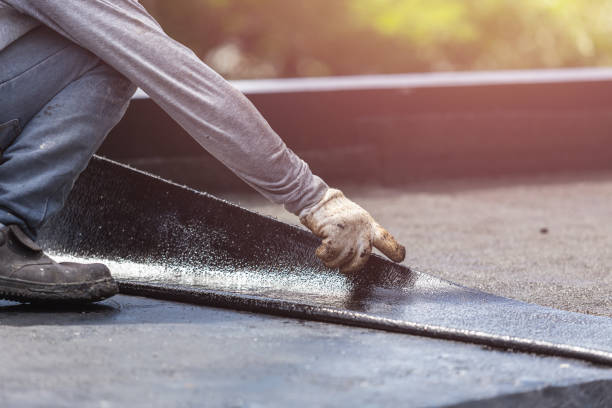 Professional Basement Waterproofing technician working in Rochester, WA